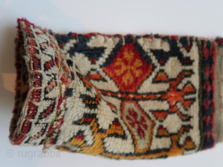 Fragmented 'transcaucasian '( mainly ) bag . Ca ; 18 cm x 32 cm . thick,   long wool and  colors.          