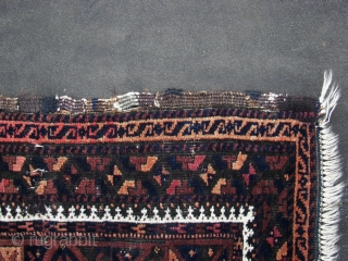 Timuri Baluch ( Khorassan ? ) ca.1920. Wool on wool. ca. 330 cm. x 160 cm. Good overall condition . Great dark blues, madder ,some peach and some yellow highlights. Some oxidation  ...