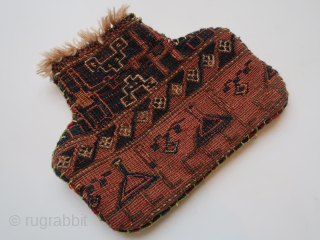 Small bag, pouch, fragmented . Ca :  33 cm . x 27 cm . Some  zoomorphic  elements  on the front side. ( Camel ? )  North West  ...