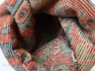 Folded / doubled fragmented bag.  Folded  ca : 26 cm x 20 cm .Floral motives ,different colors .   Persian ?         