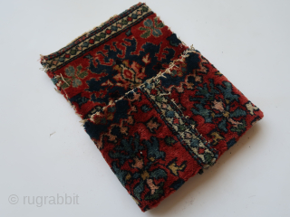 Folded / doubled fragmented bag.  Folded  ca : 26 cm x 20 cm .Floral motives ,different colors .   Persian ?         
