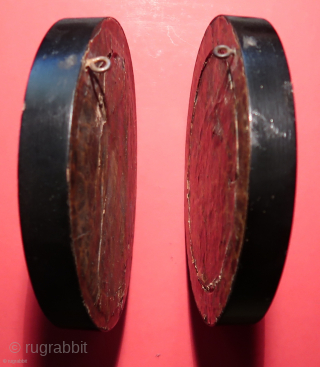 Rotterdam, 18th.century.  Two original mangan glazed Dutch tiles.   Depicting the Flood and the Exile from Eden.   Diameter including the outer wooden frame,  ca. 16 cm.   ...