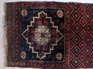 Khorjin single ,opened, a twenty-four pointed star with internal Para ( doodad )  Mamluk eight pointed strapwork star. ca 132 x 72 cm. Wool on wool. Afshari  ? 
Listening :  ...