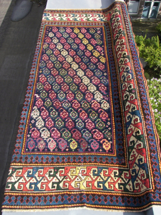 An Armenian Gendje ( Origin : German auction house.) ( also ; Ganja,Genje,Ghyandzha,Elisavetpol.) Kazak, in good allover condition. Antique. Ca. 240 x 135 cm. Long haired. ( And a great Purple.) Eagle ...