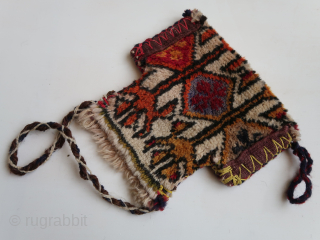 Trans Caucasian ( ? ) small fragmented bag .  Ca: 20 cm . x 23 cm. Thick piled, soft, colors.            