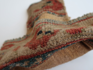 Fragmented bag, pouch, tutundan . Ca : 19,5 cm x 20,5 cm . wool, cotton, hole. 
Kurdish ?  Central Asian ? .          