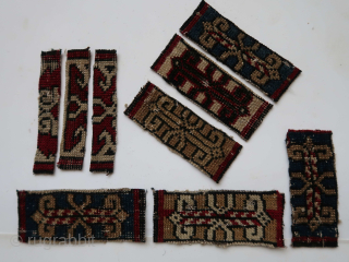 Several naval insignia,distinghuishing marks, notice the absence of an abundance of silver and gold threads. Among other things the ensign of probably the ship s surgeon ?  .Fragments.
   
 