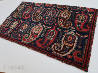 Frament, several large boteh s on a dark blue field.  Ca : 79 cm x 45 cm. Bidjar ? / Kirman ? .         