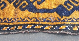 Mahswani ,old ,ca, 180 cm. x ca. 100 cm.   Wool on wool and some goathair.   A rich blue on a golden brown ( abrash ) honey field. Top  ...