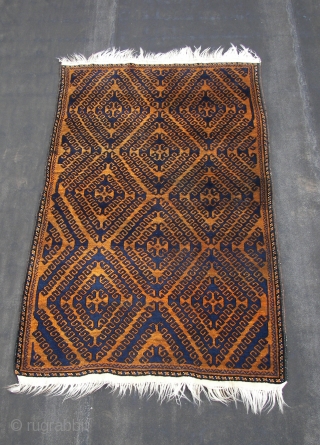 Mahswani ,old ,ca, 180 cm. x ca. 100 cm.   Wool on wool and some goathair.   A rich blue on a golden brown ( abrash ) honey field. Top  ...