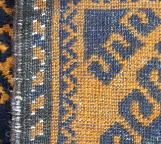 Mahswani ,old ,ca, 180 cm. x ca. 100 cm.   Wool on wool and some goathair.   A rich blue on a golden brown ( abrash ) honey field. Top  ...