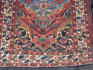 Bachtiar . Old  . ca. 195 cm. x 136 cm.  Wool on cotton.  5 cm. From top and bottom guard border missing.  Backside stitched with cotton band.   ...