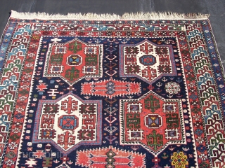 Shirwan / Shirvan .In the dark blue field ,surrounded by the main eagle beaked borders , twelve cartouche medallions have been aligned vertically in two rows of six each . Separated horizontally  ...