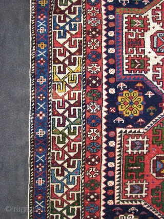 Shirwan / Shirvan .In the dark blue field ,surrounded by the main eagle beaked borders , twelve cartouche medallions have been aligned vertically in two rows of six each . Separated horizontally  ...
