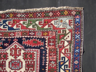 Shirwan / Shirvan .In the dark blue field ,surrounded by the main eagle beaked borders , twelve cartouche medallions have been aligned vertically in two rows of six each . Separated horizontally  ...