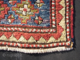 Longhaired Caucasian,with a three row selvage. Moghan ? Kazak ? Wool on wool. Old, ca:1920. ca. 240 cm. x 145 cm. Bird/animal motifs and Memling guls on the inner field. Thick ,lush  ...