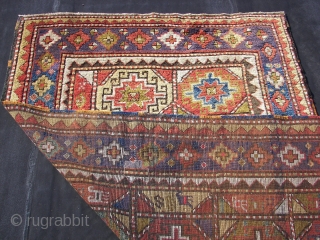 Longhaired Caucasian,with a three row selvage. Moghan ? Kazak ? Wool on wool. Old, ca:1920. ca. 240 cm. x 145 cm. Bird/animal motifs and Memling guls on the inner field. Thick ,lush  ...