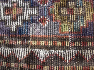 Longhaired Caucasian,with a three row selvage. Moghan ? Kazak ? Wool on wool. Old, ca:1920. ca. 240 cm. x 145 cm. Bird/animal motifs and Memling guls on the inner field. Thick ,lush  ...