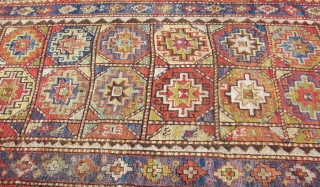 Longhaired Caucasian,with a three row selvage. Moghan ? Kazak ? Wool on wool. Old, ca:1920. ca. 240 cm. x 145 cm. Bird/animal motifs and Memling guls on the inner field. Thick ,lush  ...