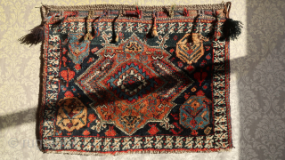 A dark blue central field with a large flattened hexaeder in it s middle. The central border comprised a double bird motif.Large Khorjin front . ca; 69 cm. x 88 cm. ...