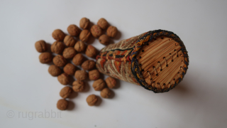 Seasons greetings with nuts. Ca ; 26 cm. x 9 cm. Wool on wool, cotton, wood, bamboo ( inside.) South west Persian tribal ?   old/antique.  95,oo euro ex transportcosts.  ...