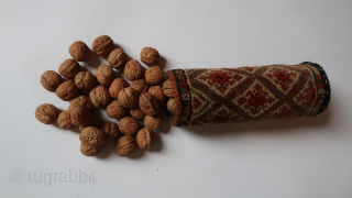 Seasons greetings with nuts. Ca ; 26 cm. x 9 cm. Wool on wool, cotton, wood, bamboo ( inside.) South west Persian tribal ?   old/antique.  95,oo euro ex transportcosts.  ...