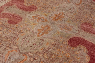 Oushak Carpet

9.0 x 13.5
2.74 x 4.11

The rather worn madder red open field is nearly covered by an oversize double spadiform  ivory medallion with internal red arabesque outlining which is repeated in  ...