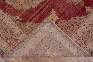 Oushak Carpet

9.0 x 13.5
2.74 x 4.11

The rather worn madder red open field is nearly covered by an oversize double spadiform  ivory medallion with internal red arabesque outlining which is repeated in  ...