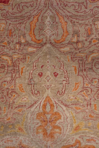 Oushak Carpet

9.0 x 13.5
2.74 x 4.11

The rather worn madder red open field is nearly covered by an oversize double spadiform  ivory medallion with internal red arabesque outlining which is repeated in  ...