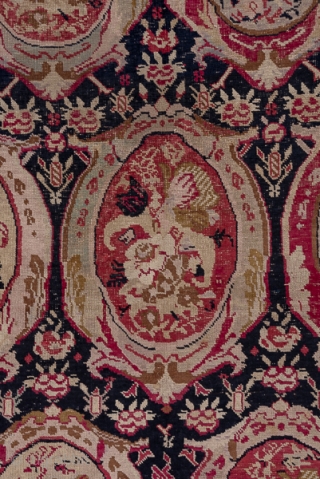 Karabagh Gallery Carpet

7.1 x 19.2
2.16 x 5.85

This south Caucasian carpet is in the Russian style with columns of elliptical "mirrors" displaying European-style floral bouquets on a contrasting black ground. The cochineal scarlet  ...