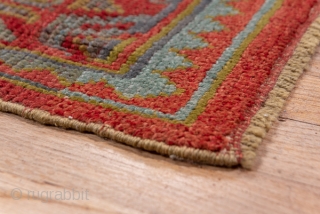 Oushak Carpet

14.0 x 18.2
4.26 x 5.54

The  abrashed soft madder red field of this western Turkish workshop carpet displays an allover yaprak ("leaf") pattern mixing  ragged palmettes and broken, hooked lozenges  ...