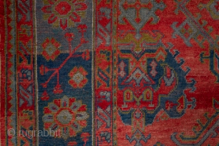Oushak Carpet

14.0 x 18.2
4.26 x 5.54

The  abrashed soft madder red field of this western Turkish workshop carpet displays an allover yaprak ("leaf") pattern mixing  ragged palmettes and broken, hooked lozenges  ...
