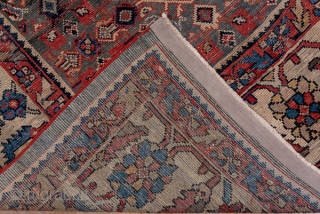 Mahal Carpet

9.0 x 12.5
2.74 x 3.18

An ivory detailed allover Herati design fills the green field of this attractive west Persian rural carpet. The ivory main border employs the triple posy "tangerine flower"  ...