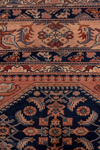 Lilian Carpet

12.3 x 19.0
3.74 x 5.79

This Hamadan area roomsize has a dark blue  octagonal subfield edged with tiny botehs and a classic Herati design overall. Double vases with jagged leaves decorate  ...