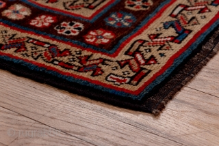 Kurd Runner

3.2 x 11.3
0.97 x 3.44

A chunky Mina Khani design of rosettes and smaller flowers closely covers the navy field of this all wool tribal runner. The ochre minor borders with their  ...