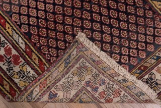 Malayer Runner

3.1 x 12.6
0.94 x 3.84

The  abrashed charcoal field features a close seme of tiny ovals within an ivory triple flower border in the Turkish manner and flanking diagonal colour-striped minors.  ...