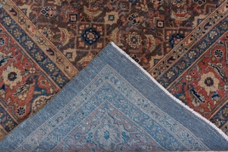 Mahal Carpet

8.9 x 12.0
2.71 x 3.65

A classic small pattern Persian allover Herati pattern fills the medium bark brown field of this west Iranian village carpet. The caramel tone main border shows simple  ...