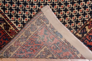 Baktiary Runner

3.1 x 14.7
0.94 x 4.48

The  old ivory field displays a tiny flower and fat blue 'X' repeating textile pattern, framed by straw simple undulating vine minors and a wider red  ...