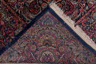 Kerman Carpet

8.10 x 17.0 
2.46 x 5.28
This top condition 1930's SE Persian urban carpet has a dark blue field covered with a fantgasy of palmettes radiating peacock  tails of floral sprays,  ...