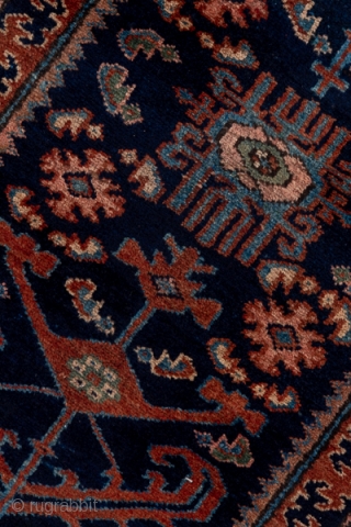 Hamadan Runner

3.0 by 18.0

Circa: 1920

More village Hamadan than Malayer, this repaired, but good pile runner has a predominantly dark palette  with a navy field centered by a chevron-branched pole medallion interrupted  ...