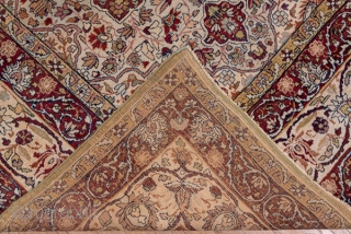 Kerman Carpet

9.0 x 12.0
2.74 x 3.65

On an old ivory field are set four eight-point red star medallions around which swirl flowering vines. The ivory main border of this SE Persian city carpet  ...