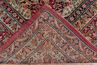 Kerman Carpet

9.0 by 12.3
2.74 x 3.74

The crisp cochineal red field displays a giant, lobed ivory medallion with dark blue interior spadiform palmettes. The ivory corners feature split navy arabesques and the main  ...