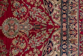 Kerman Carpet

9.0 by 12.3
2.74 x 3.74

The crisp cochineal red field displays a giant, lobed ivory medallion with dark blue interior spadiform palmettes. The ivory corners feature split navy arabesques and the main  ...