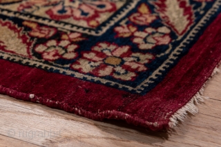 Kerman Carpet

9.0 by 12.3
2.74 x 3.74

The crisp cochineal red field displays a giant, lobed ivory medallion with dark blue interior spadiform palmettes. The ivory corners feature split navy arabesques and the main  ...