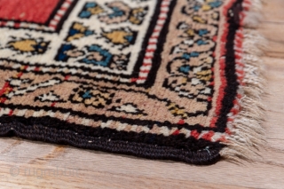 Malayer Runner

3.7 x 14.5
1.12 x 4.41

The brisk red field displays rows of slightly leaning slender floriated botehs, three to a line in a clearly textile-derived pattern. The cream main border of this  ...