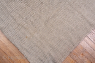 Tulu Mansion Carpet

13.9 by 23.1
4.23 x 7.04 

This oversize central Anatolian village carpet is very coarse woven with  multiple wefts, recumbent, long pile and a flattish surface of uniformly oatmeal colour.  ...