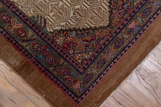 Hamadan Runner

3.3 x 14.5
1.0 x 4.41

A nut brown camel tone plain border and a vine and hexagon inner stripe frame the ivory field with a background  honeycomb lattice and flower pattern,  ...