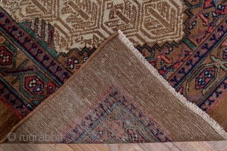 Hamadan Runner

3.3 x 14.5
1.0 x 4.41

A nut brown camel tone plain border and a vine and hexagon inner stripe frame the ivory field with a background  honeycomb lattice and flower pattern,  ...