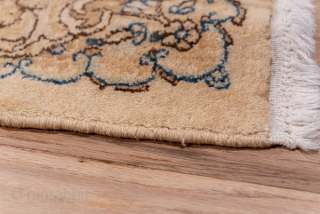 Kerman Runner

2.9 by 17.0
0.88 x 5.18

This ivory ground SE Persian city runner displays a detached flower spray pattern in light blue, sienna brown, pistachio, buff, salmon   and tan, all within  ...