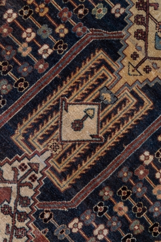 Baktiary Runner

3.9 x 13.8
1.18 x 4.20
 
This Chahar Mahal village kenare in lowish, but even condition, sports an abrashed dark blue ground centred on a pole medallion of three large, stepped, ivory  ...